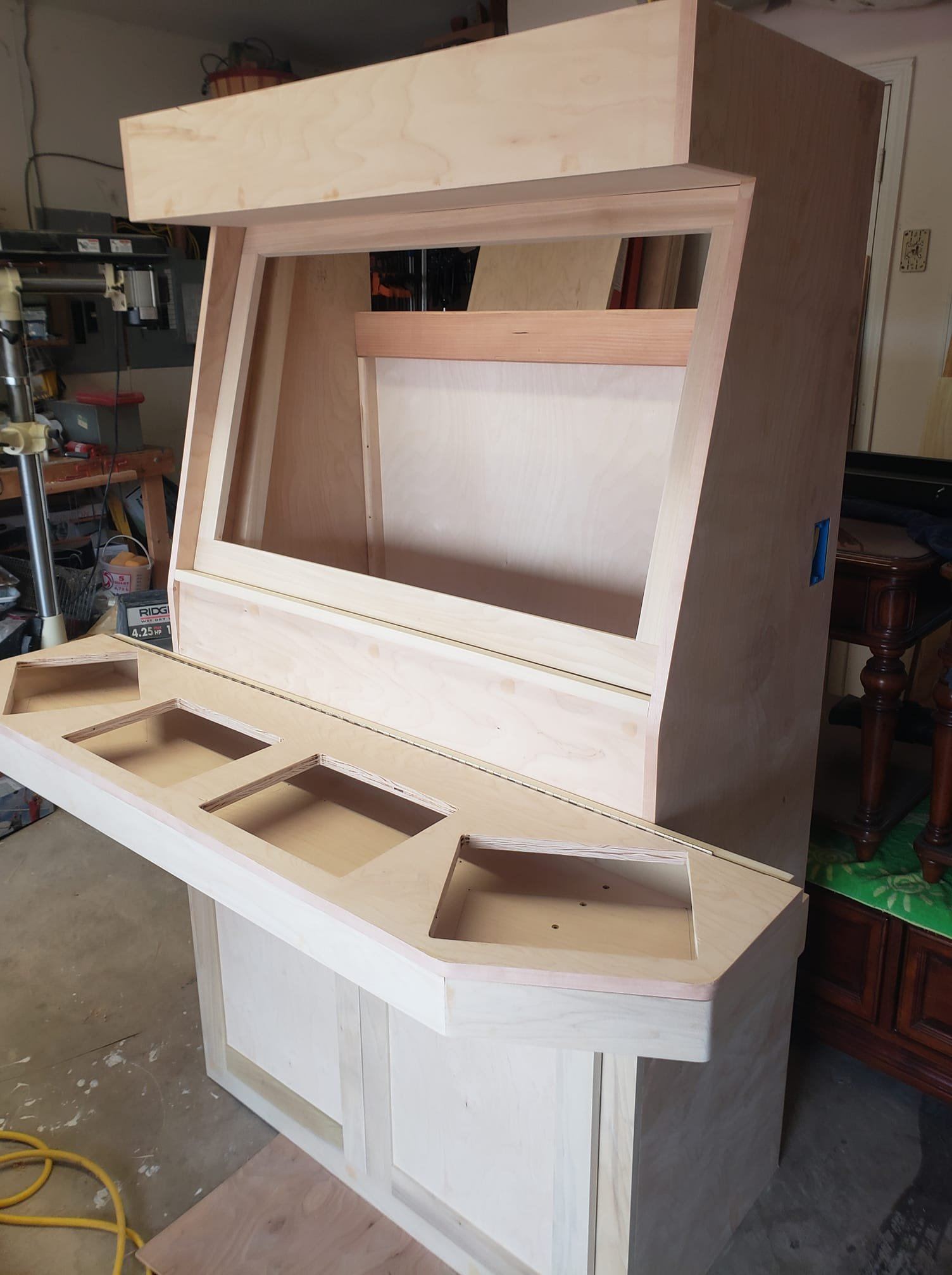 Custom four-player arcade gaming console cabinet built by Pintail Woodworks